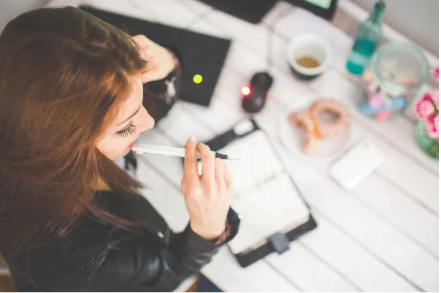 A woman trying to write